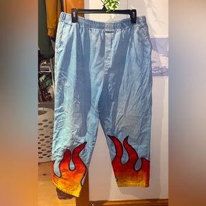 ONE SIZE FITS ALL Baggy custom flame painted jeans. Very steezy.